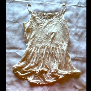 Soft cream top with crotchet back